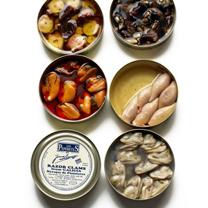 open tins of Spanish seafood