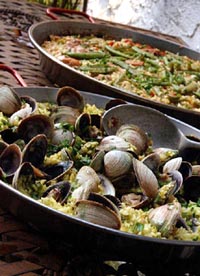 two paellas side by side