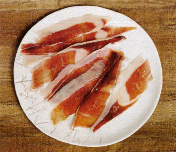 plate of thinly sliced ibérico de bellota ham